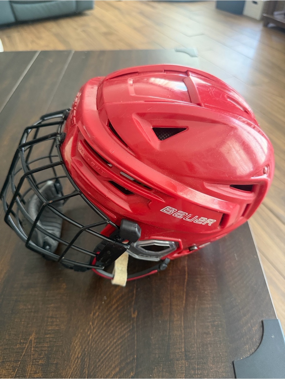 Bauer Red Hockey Helmet with Black Cage Guard